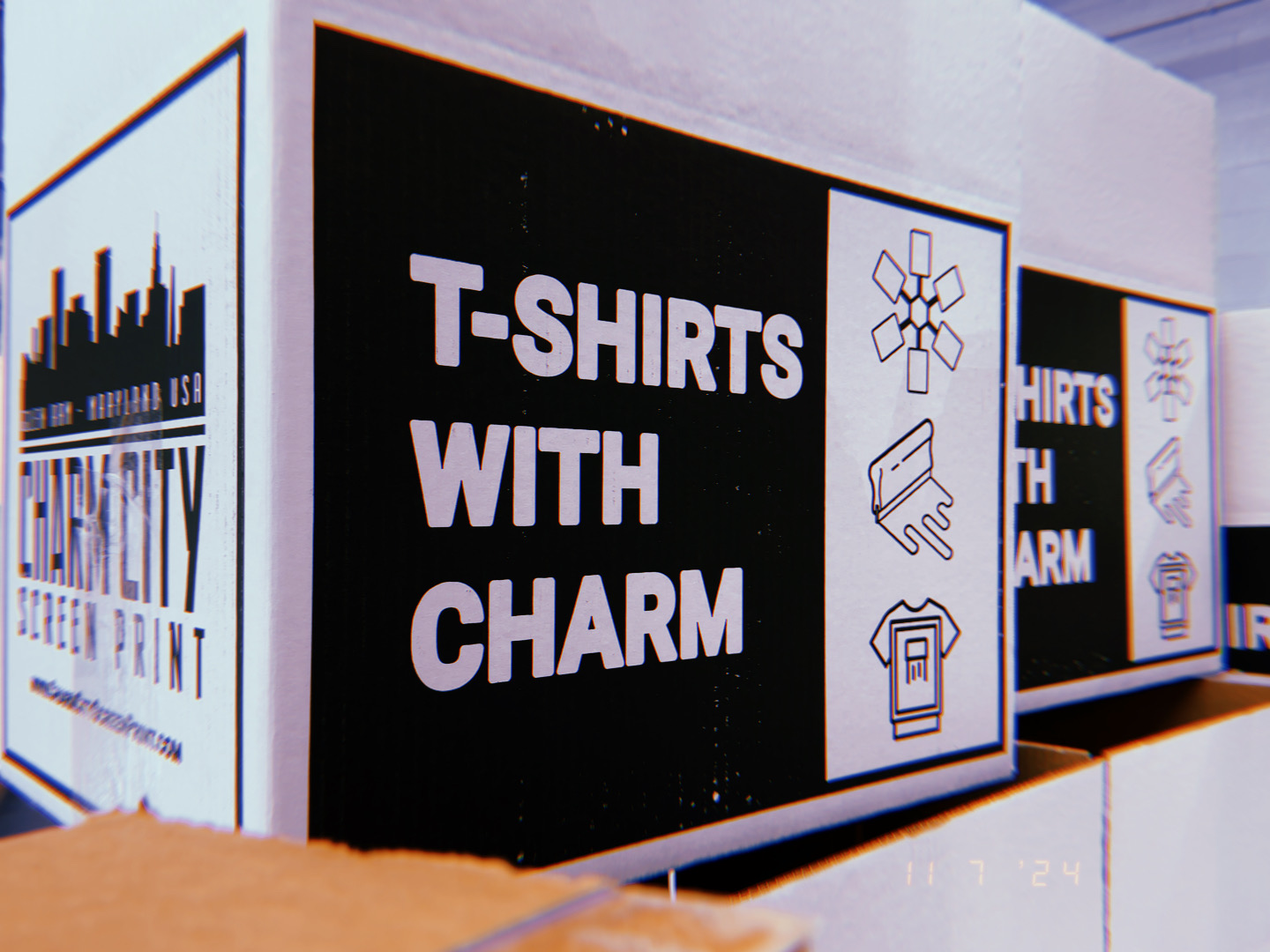 Charm City Screen Print Box with "T-shirts with charm" on the box 